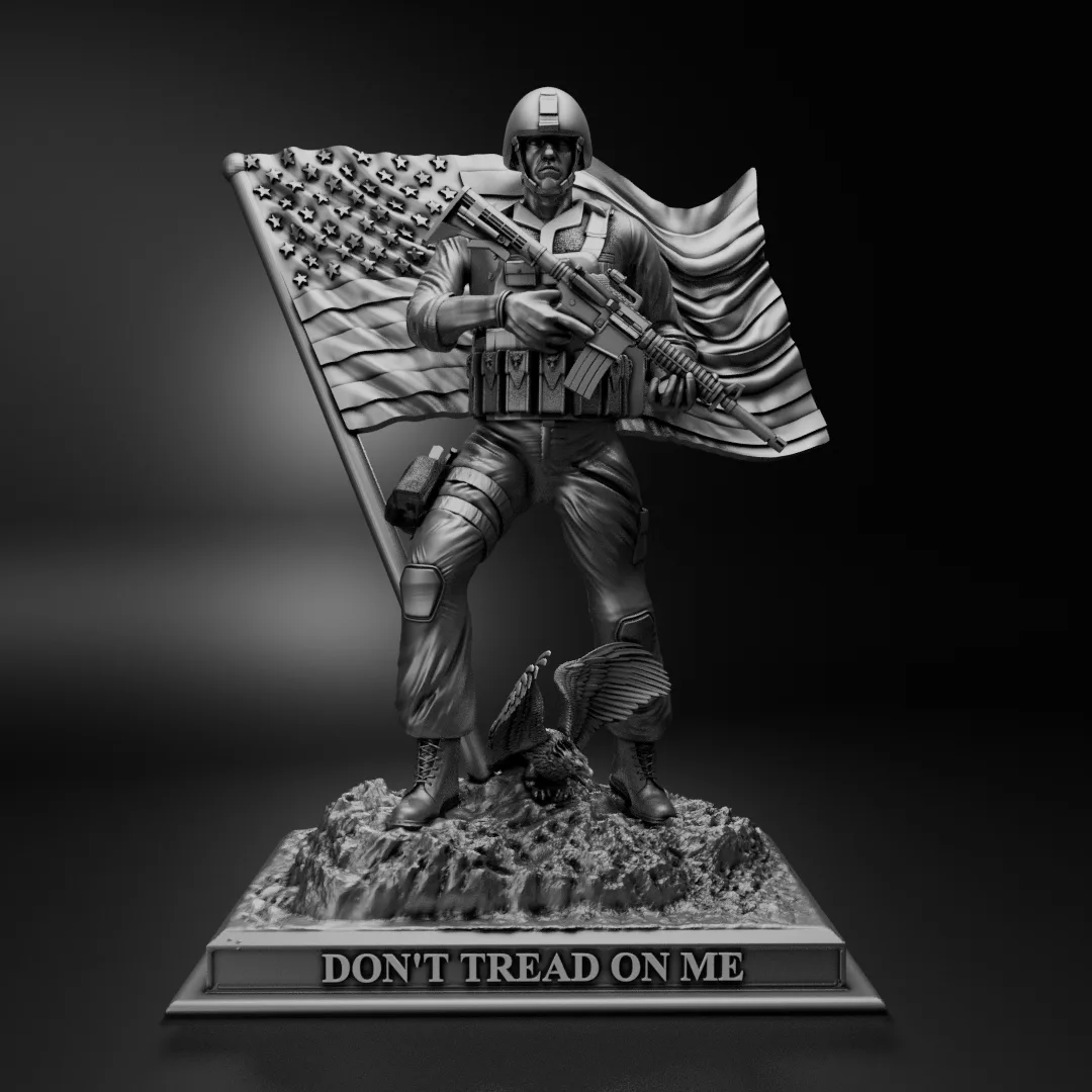 Soldier statue in front of a waving flag on a rocky base